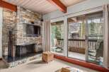 Experience luxury living in this stunning property featuring a cozy fireplace and a private balcony with breathtaking views.