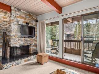 Experience luxury living in this stunning property featuring a cozy fireplace and a private balcony with breathtaking views.