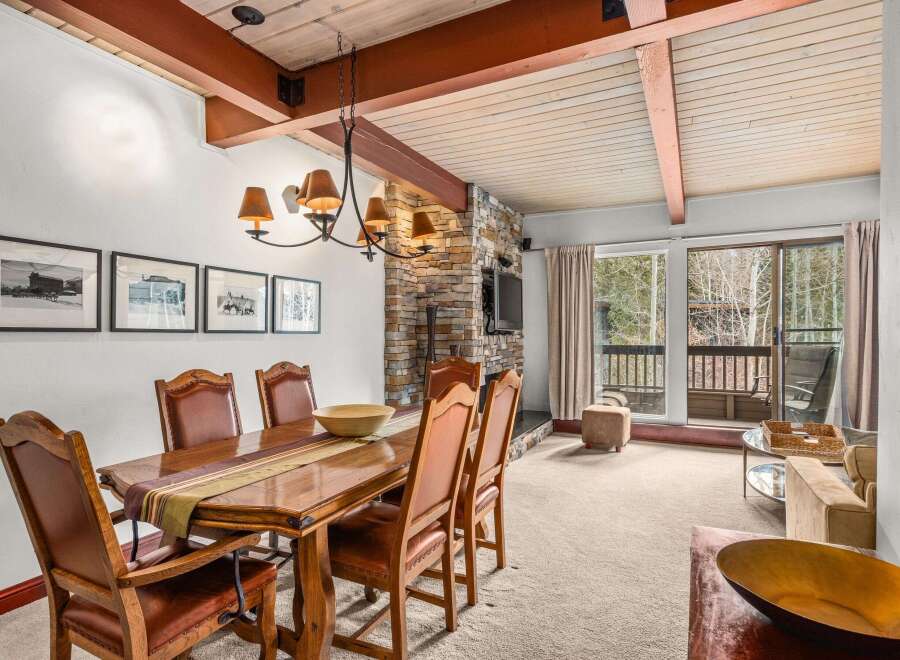 Step into luxury with this stunning property, featuring a beautifully designed dining area perfect for hosting gatherings.