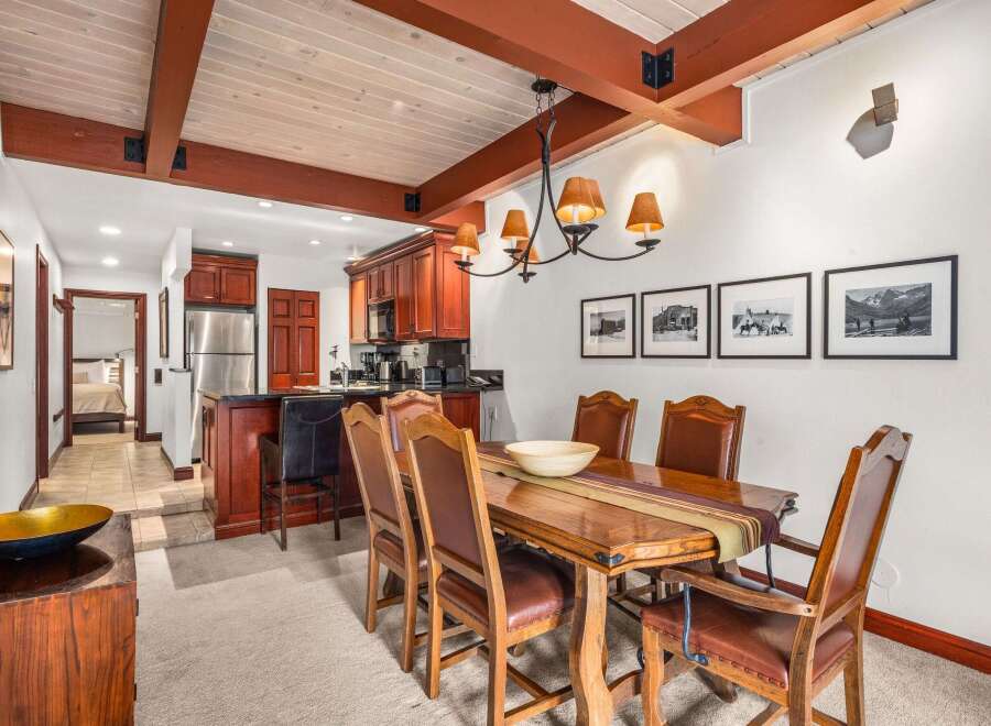 Step into this stunning property and be captivated by its inviting dining area.