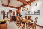 Step into this stunning property and be captivated by its inviting dining area.