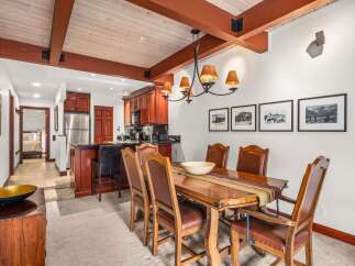 Step into this stunning property and be captivated by its inviting dining area.