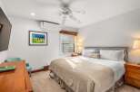 This cozy bedroom offers a comfortable retreat with its inviting ambiance.