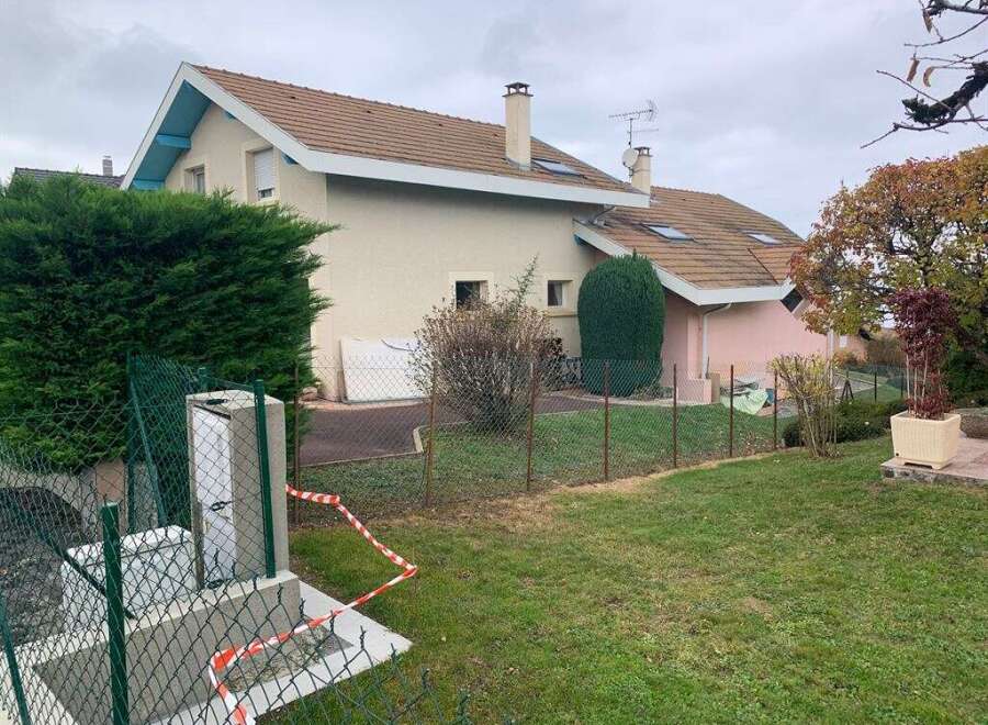 Discover this charming property featuring a well-maintained exterior and a lush green lawn, perfect for outdoor enjoyment.