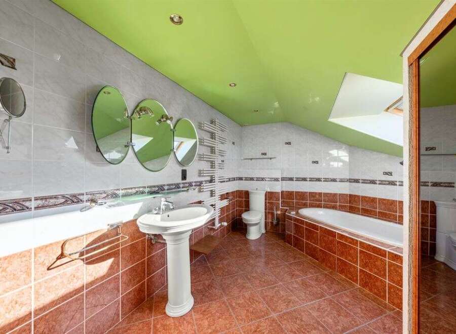 Step into luxury with this stunning bathroom featuring a unique design and high-end finishes.