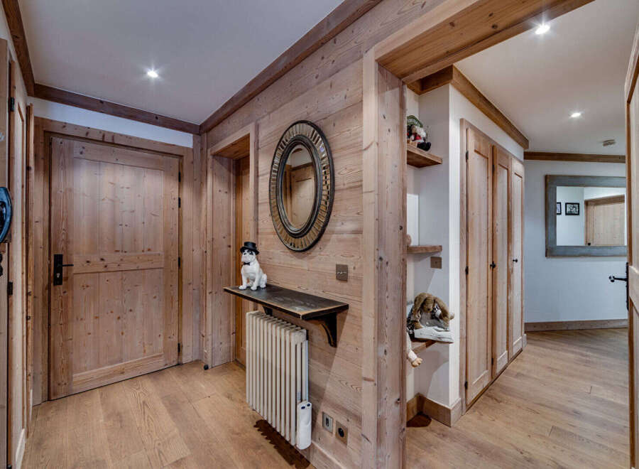 Step into this inviting entryway, showcasing a blend of rustic charm and modern design.