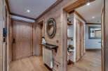 Step into this inviting entryway, showcasing a blend of rustic charm and modern design.