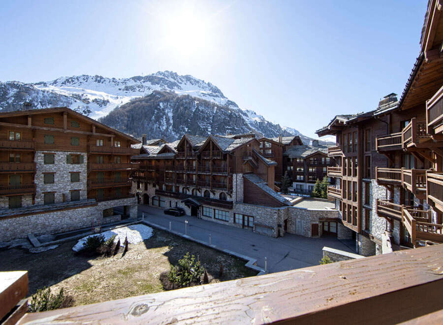 Discover the charm of this stunning mountain property, featuring exquisite wooden architecture and stone accents.