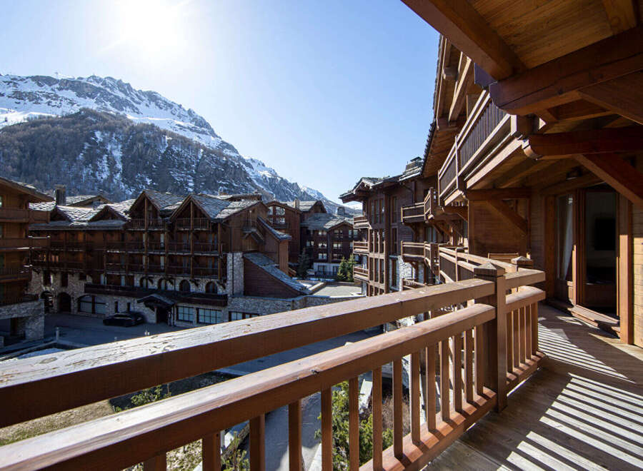 Experience the charm of mountain living in this stunning property, showcasing exquisite wooden architecture and breathtaking views.