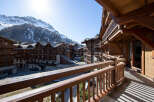 Experience the charm of mountain living in this stunning property, showcasing exquisite wooden architecture and breathtaking views.