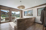 Experience luxury living in this stunning property, featuring a spacious bedroom with breathtaking views.