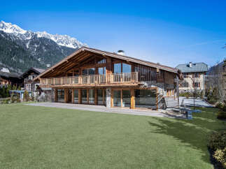 This stunning chalet-style home offers a luxurious mountain retreat with breathtaking views.