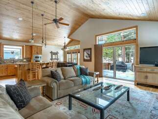 Step into a cozy living space with a rustic charm.