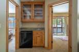 Discover the charm of this beautifully designed property, featuring a convenient wet bar area perfect for entertaining.