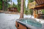 Enjoy a relaxing getaway in this stunning property featuring a luxurious hot tub, perfect for unwinding after a day of outdoor adventures.
