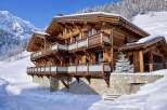 Experience the epitome of alpine luxury in this stunning wooden chalet.