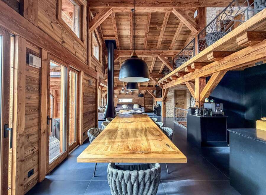 Experience the epitome of luxury living in this stunning property, showcasing exquisite wooden architecture and a spacious, open-plan design.