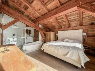 Experience luxury living in this stunning property featuring a unique blend of rustic charm and modern elegance.