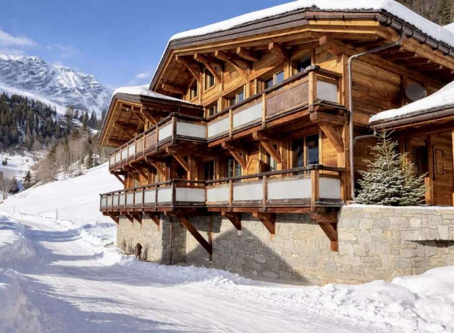 Experience the epitome of alpine luxury in this stunning wooden chalet.