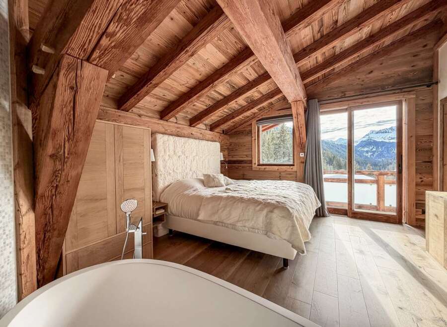 Experience luxury living in this stunning chalet-style bedroom.