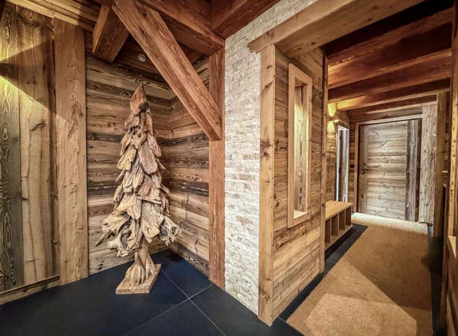 Step into rustic elegance with this stunning hallway design.