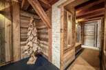 Step into rustic elegance with this stunning hallway design.