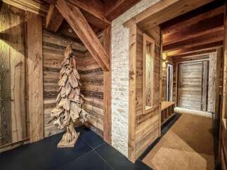 Step into rustic elegance with this stunning hallway design.