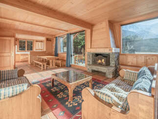 Experience the warmth and charm of this stunning property, featuring a cozy fireplace and inviting living spaces.
