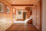 Step into this inviting entryway, showcasing a warm and rustic design.