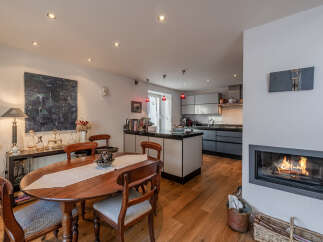 This stunning property boasts a seamless blend of modern design and classic charm.