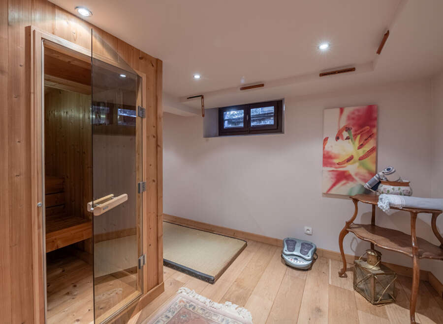 Step into relaxation with this stunning sauna room, perfect for unwinding after a long day.