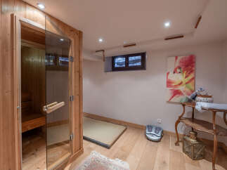 Step into relaxation with this stunning sauna room, perfect for unwinding after a long day.