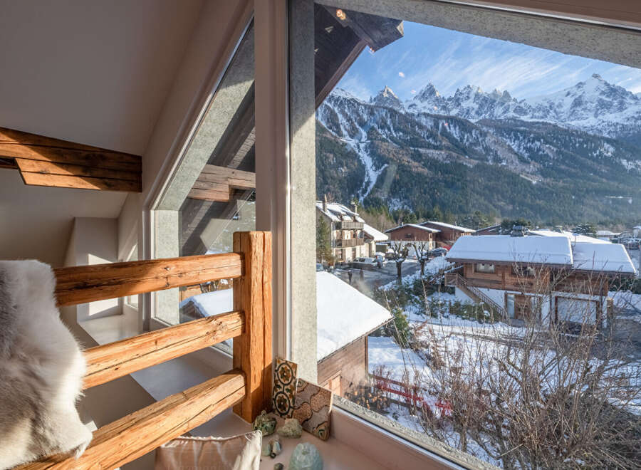 Experience breathtaking mountain views from this charming property.