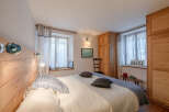 This charming bedroom features a cozy and inviting atmosphere, perfect for relaxation.