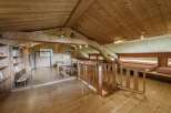 This stunning wooden chalet offers a warm and inviting atmosphere, perfect for a cozy retreat.