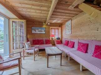 Step into a cozy chalet retreat with this inviting living space.