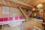Step into this charming cabin retreat, featuring warm wooden interiors and a cozy atmosphere.