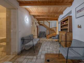 Step into this charming property featuring a warm and inviting interior.