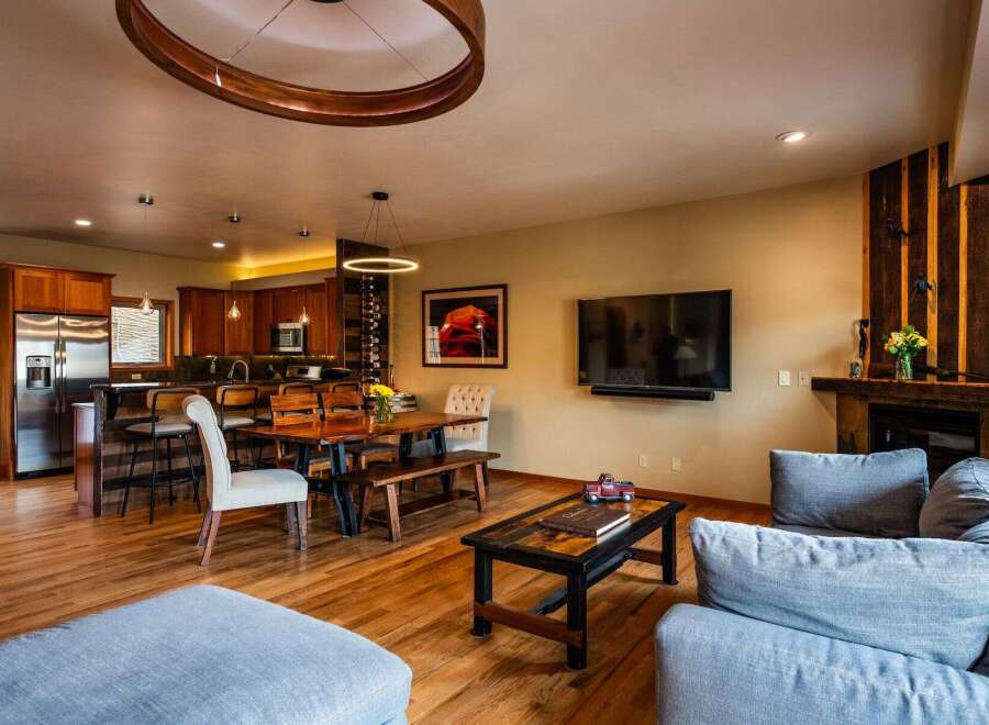 This stunning property boasts a spacious open-concept living area, perfect for entertaining.