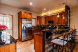This stunning kitchen boasts a modern design with a touch of rustic charm.