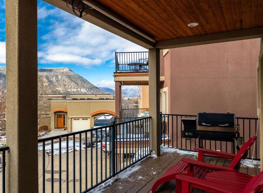 Enjoy breathtaking views from this stunning property! This home features a spacious balcony with a grill, perfect for outdoor entertaining.