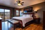 This stunning bedroom boasts a luxurious and inviting atmosphere, perfect for relaxation.