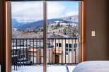Enjoy breathtaking mountain views from this stunning property! This home features a modern design with large windows, allowing natural light to flood the interior.