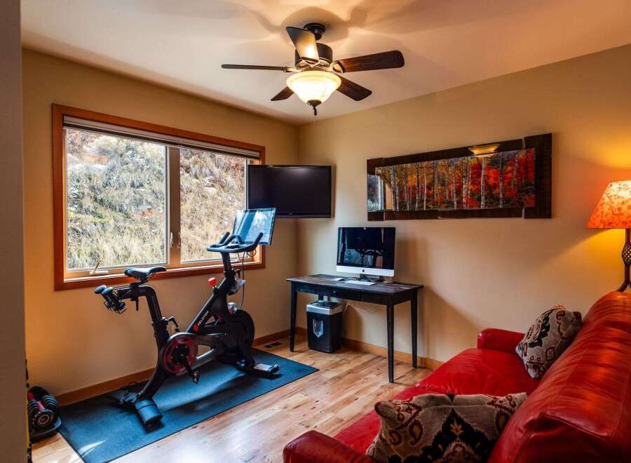 This home gym offers a perfect blend of fitness and relaxation.