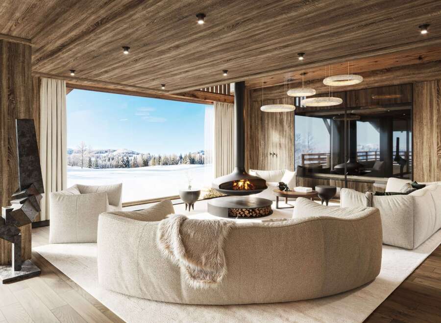Experience luxury living in this stunning chalet, boasting a cozy fireplace and breathtaking views of a snow-covered landscape.