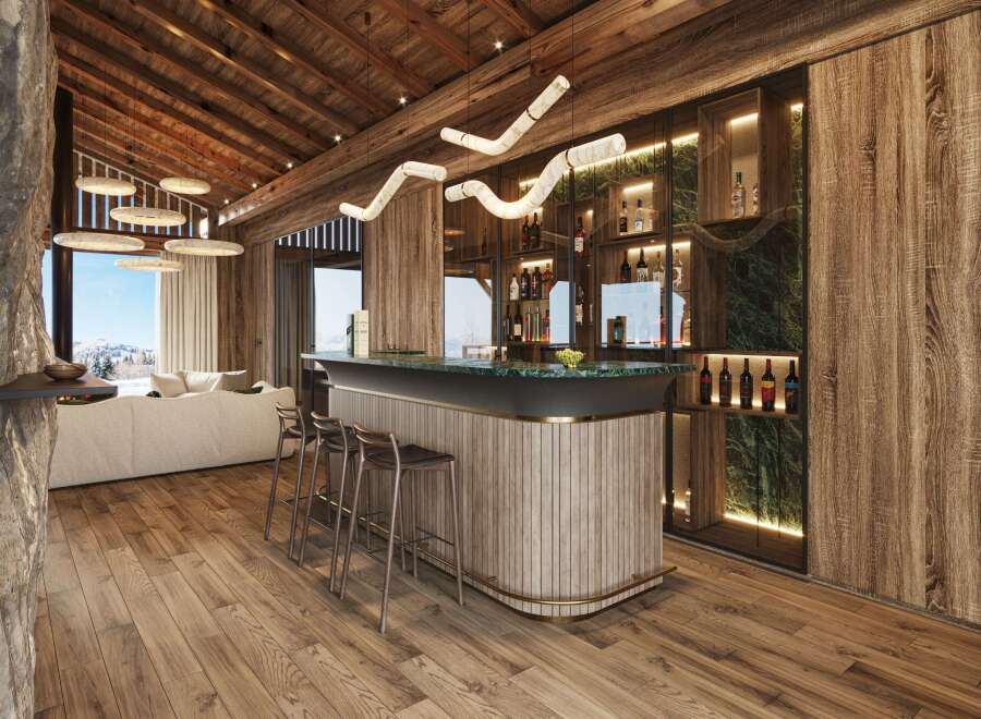 Experience luxury living in this stunning chalet, featuring a custom-built bar perfect for entertaining.