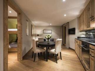 Discover the charm of this beautifully designed property, featuring a modern kitchen with sleek appliances and ample storage.