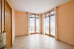 This stunning property boasts a bright and airy interior with large windows that offer breathtaking views.