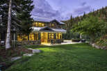 This stunning mountain home offers a perfect blend of rustic charm and modern luxury.