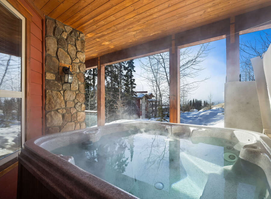 Enjoy the ultimate relaxation experience in this stunning property featuring a luxurious hot tub.